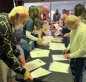 During the Jan. 25 meeting, Rotary Club members helped fill 500 children’s dental health bags with toothbrushes, toothpaste, floss picks, tooth activity page, stickers, hygiene instructions (courtesy of Corbin Dental and Rotary Club of Franklin) and a Rotary insert.